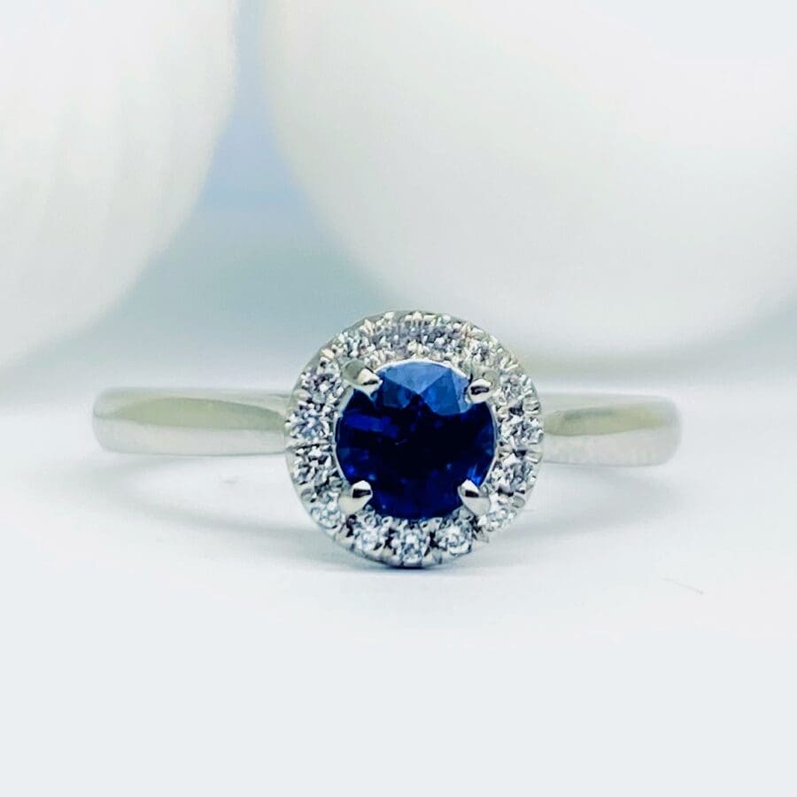 15600046 Platinum, Diamond and Sapphire Halo Cluster Ring