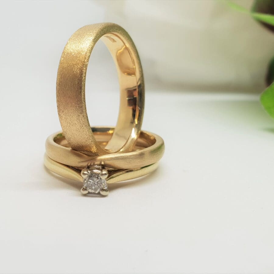 316 Commission Women's Brushed Ribbon Twist, Men's Frosted Wedding Band