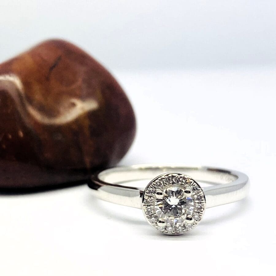 15600047 Platinum And Diamond Halo Cluster Ring