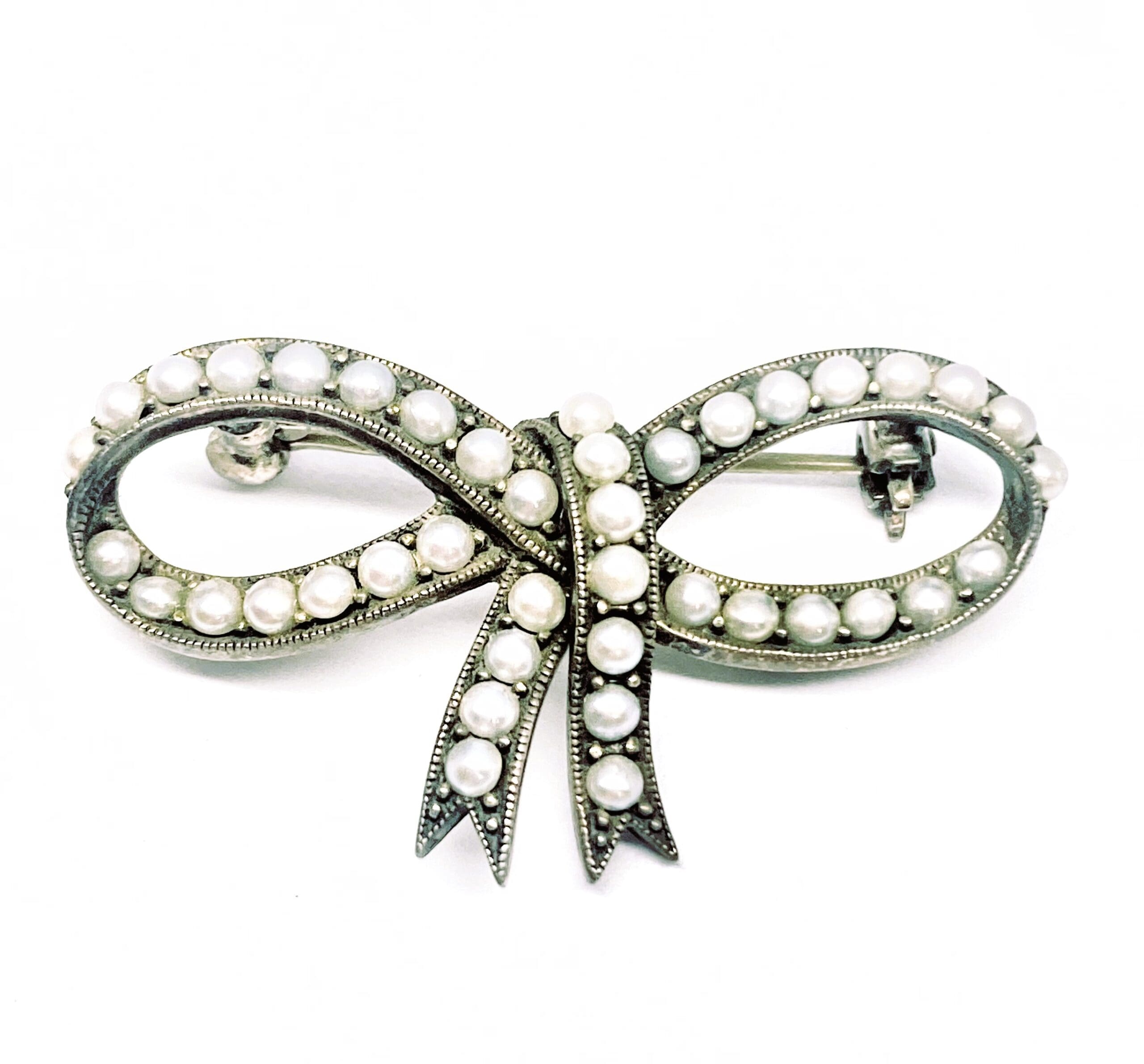 50200006 925 Sterling Silver Marcasite Half Pearl Bow Brooch