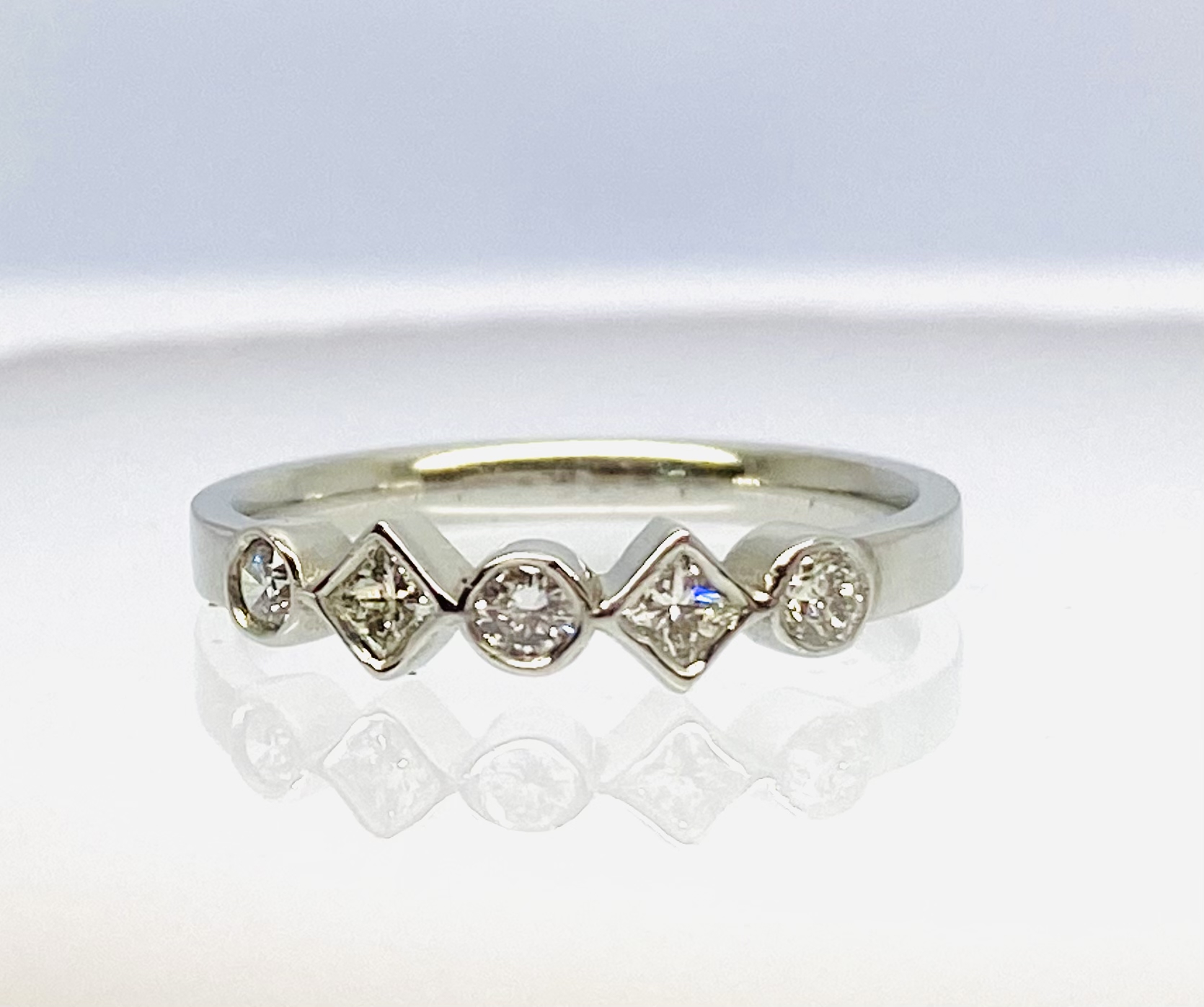 13600090 Platinum And Diamond Mixed Round And Princess Dress Ring - Image 3