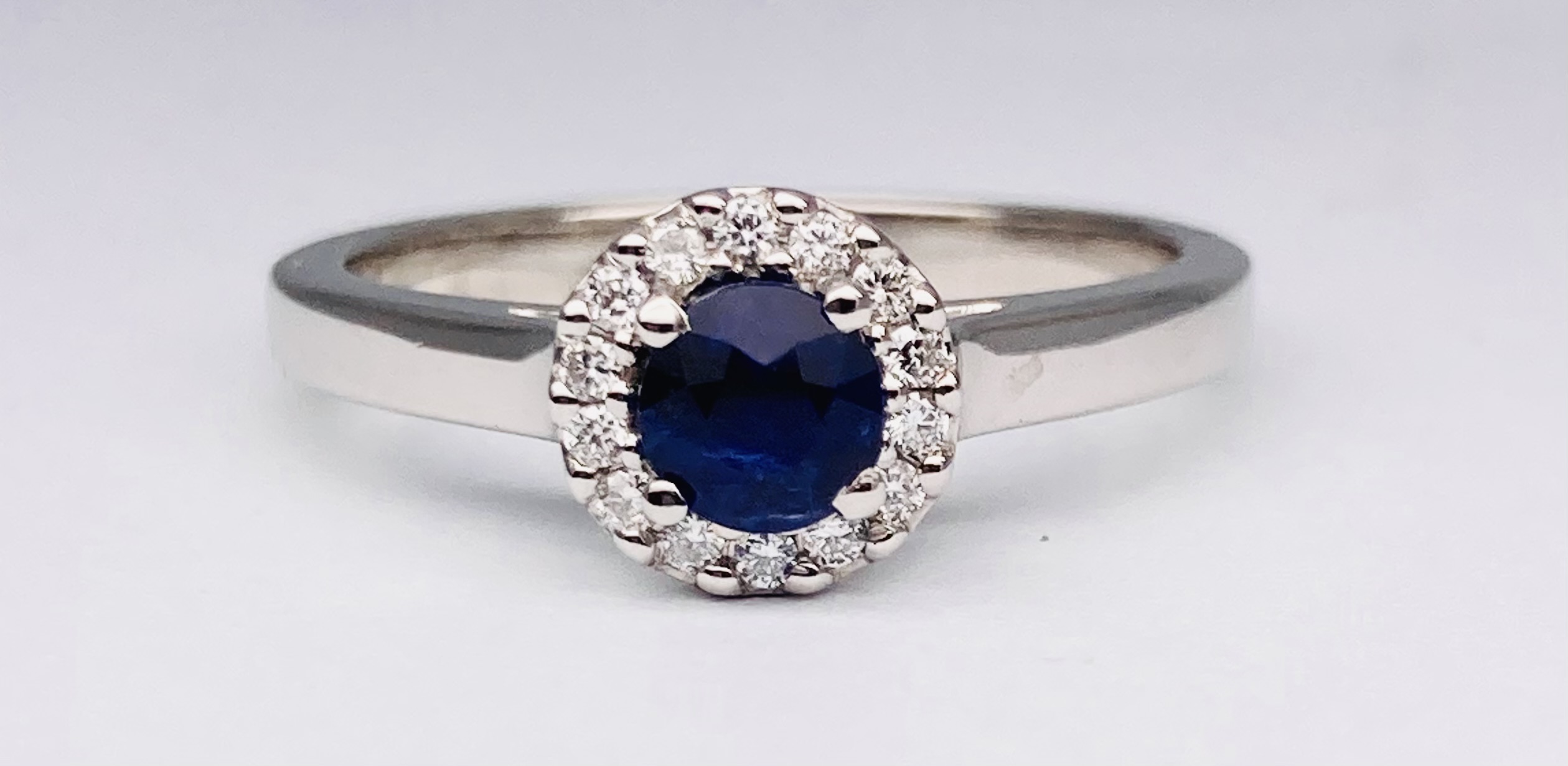 15600053 Platinum, Blue Sapphire and Diamond Halo Ring - Image 4