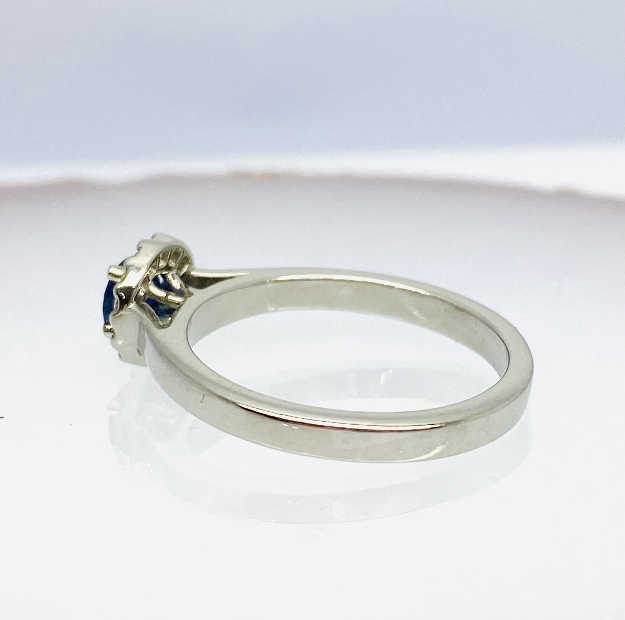 15600053 Platinum, Blue Sapphire and Diamond Halo Ring - Image 2