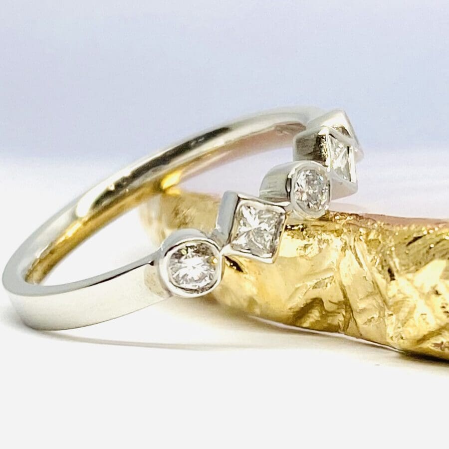 13600090 Platinum And Diamond Mixed Round And Princess Dress Ring