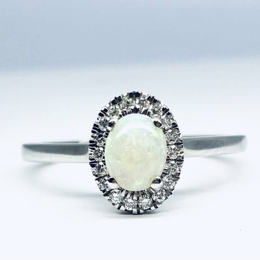 15600052 Platinum Opal And Diamond Halo Ring