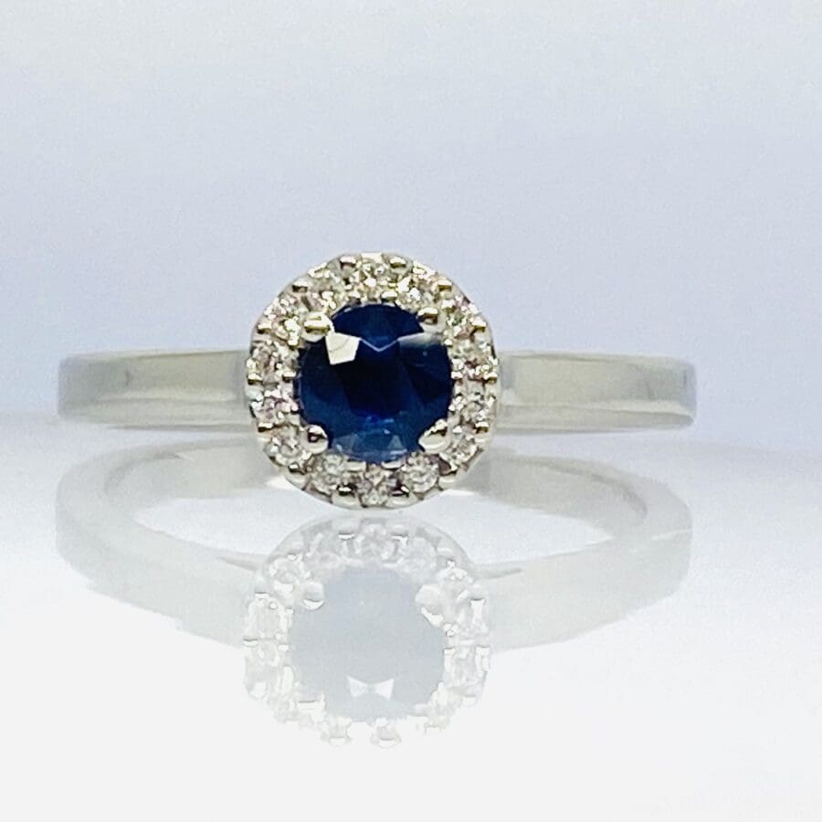 15600053 Platinum, Blue Sapphire and Diamond Halo Ring