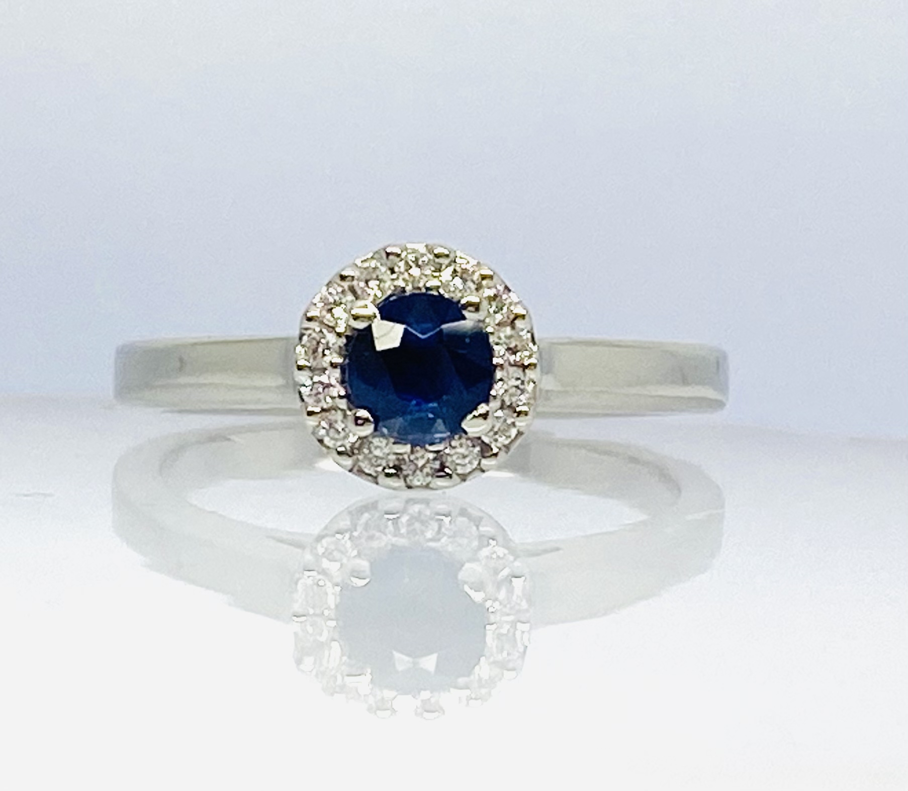 15600053 Platinum, Blue Sapphire and Diamond Halo Ring