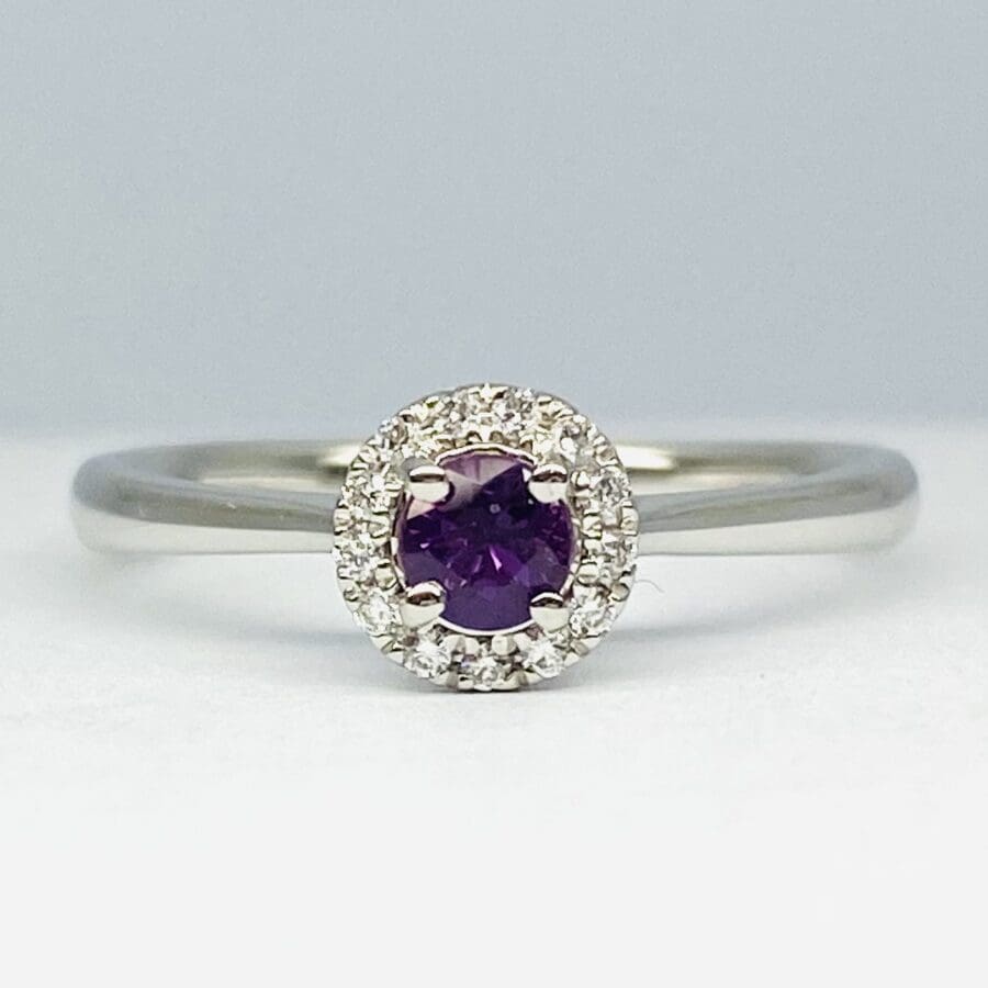 15600054 Platinum Purple Sapphire And Diamond Halo Ring