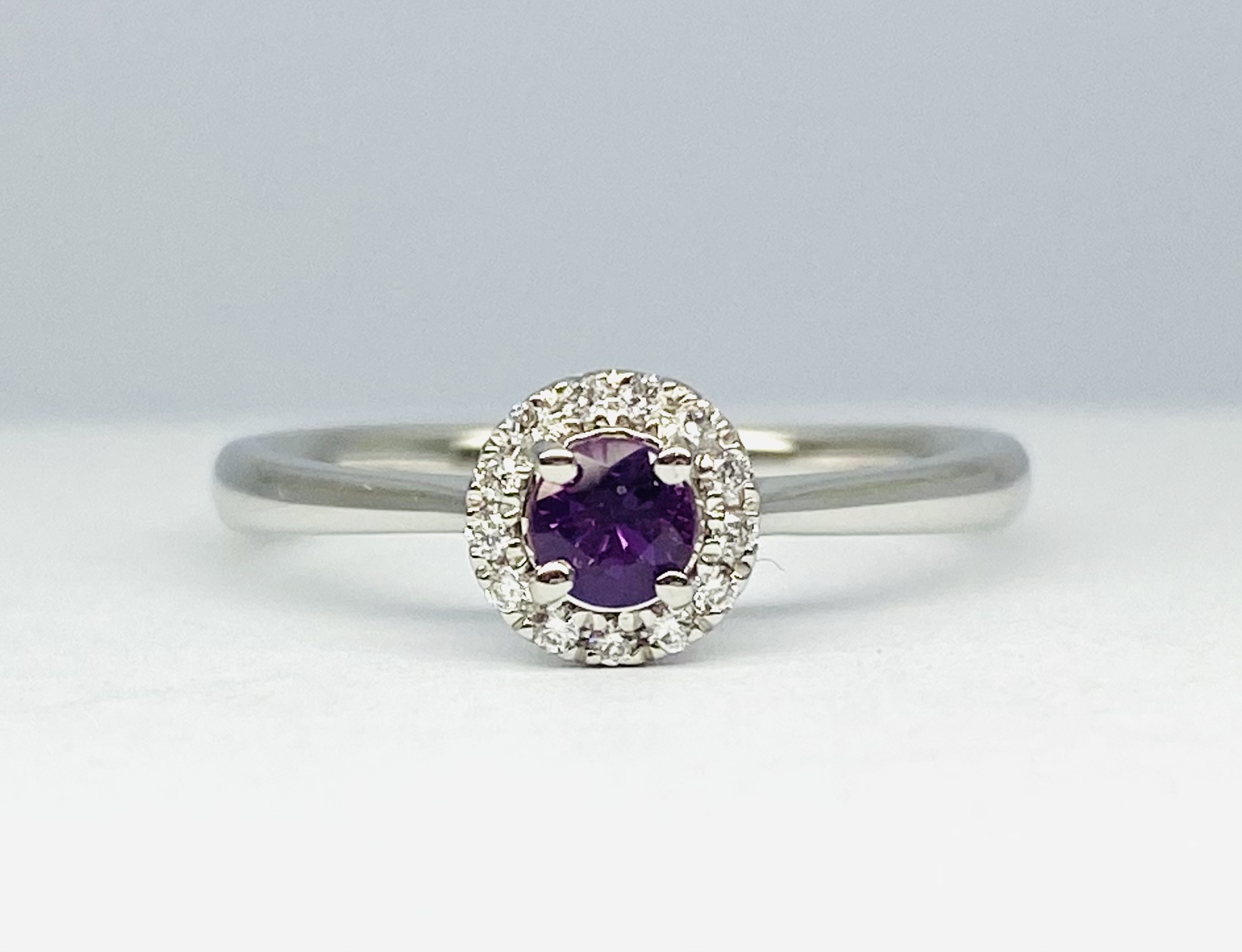 15600054 Platinum Purple Sapphire And Diamond Halo Ring