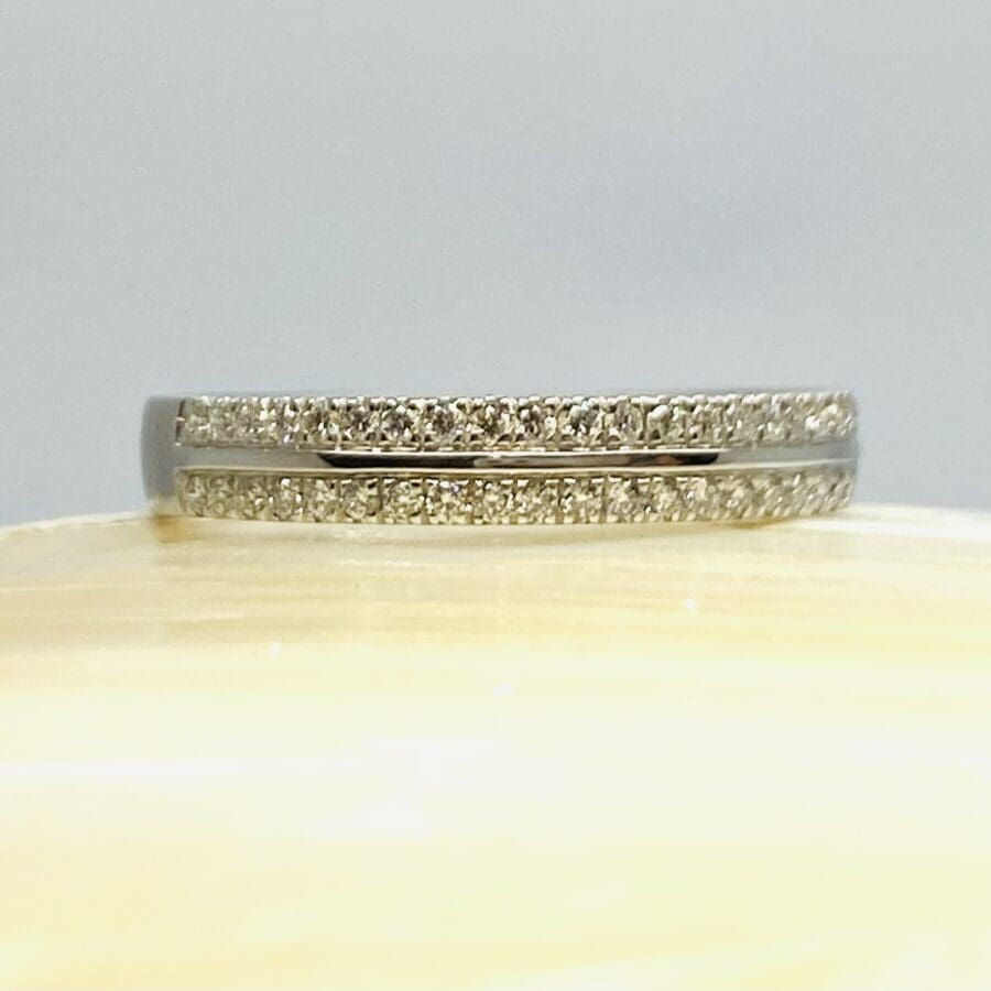 13600092 Platinum And Diamond Two Row 0.24ct Half Eternity Ring