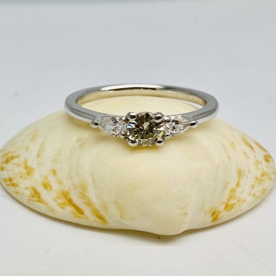 12600105 Platinum And 3 x Diamond Engagement Ring With A Natural Yellow Diamond Centre